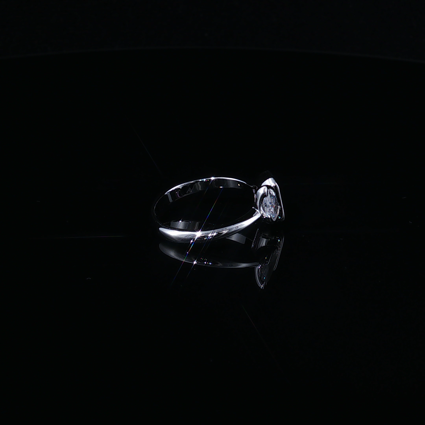 Silver Bypass Ring with Emerald-Cut Synthetic Tourmaline and Pear-Cut Zirconium
