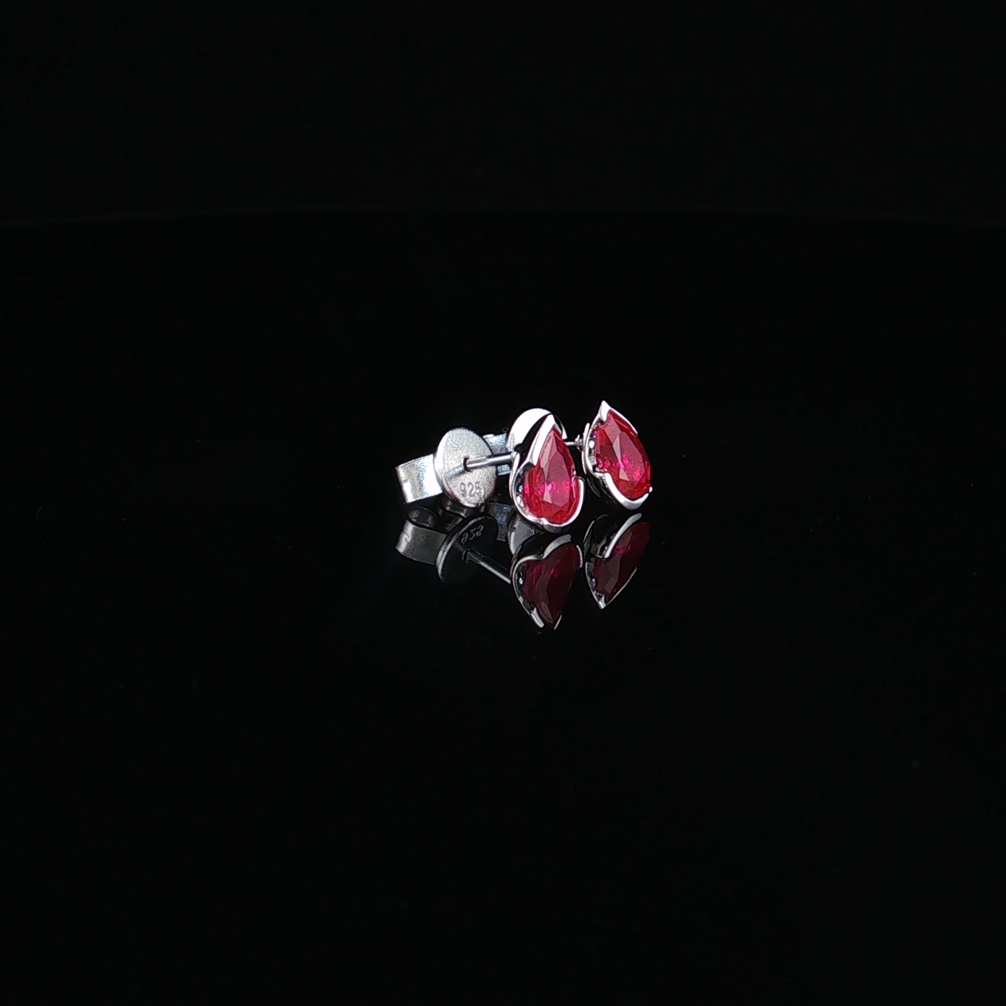 Pear-Shaped Ruby Stud Earrings in premium Sterling silver
