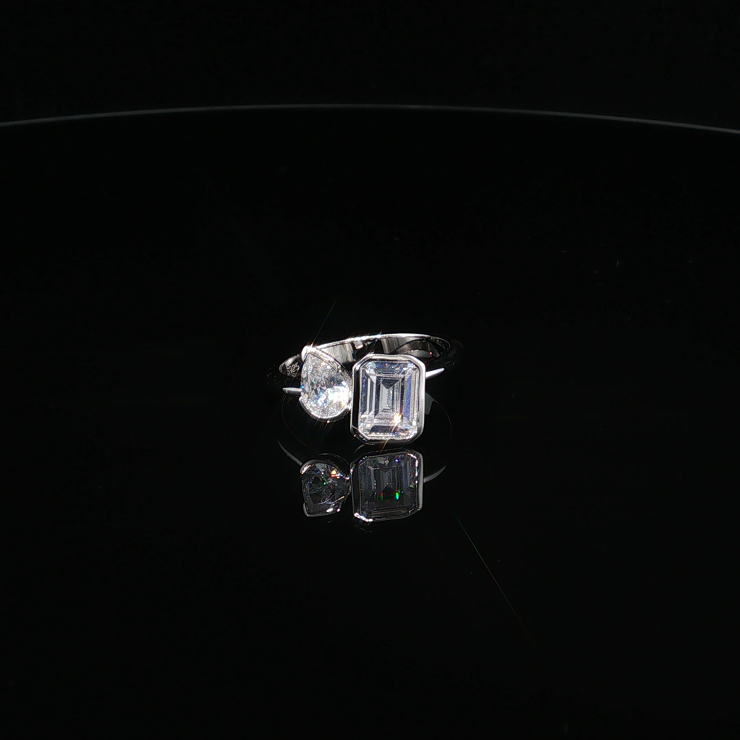 Emerald and Pear Cut Zirconium Toi et Moi Bypass Ring in Premium Sterling Silver
