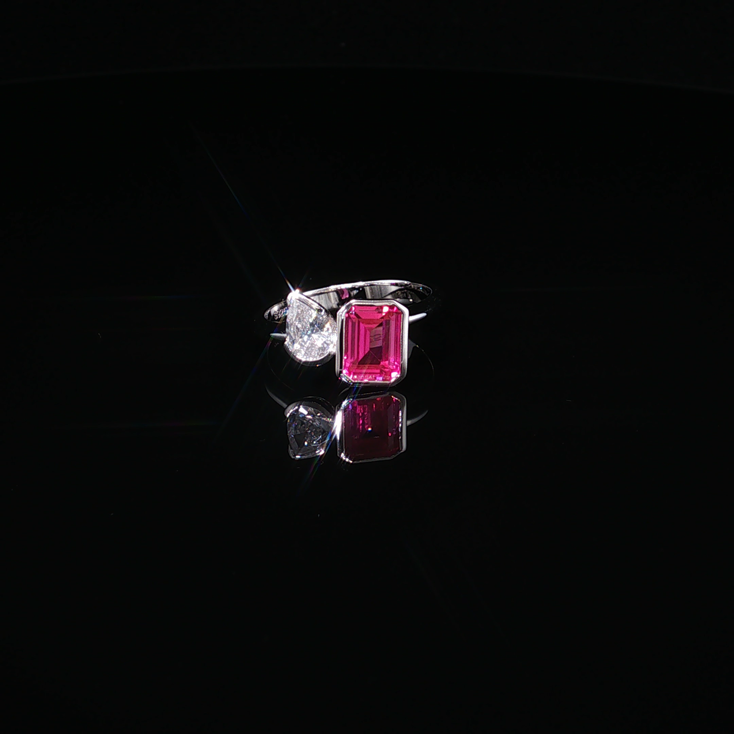 Emerald-Cut Pink Tourmaline and Pear-Shaped Zirconium Toi et Moi Ring in Premium Sterling Silver