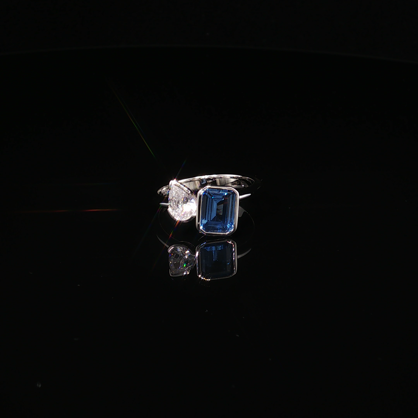 Premium Sterling Silver Toi et Moi Ring with Emerald-Cut London Blue Topaz and Pear Zirconium