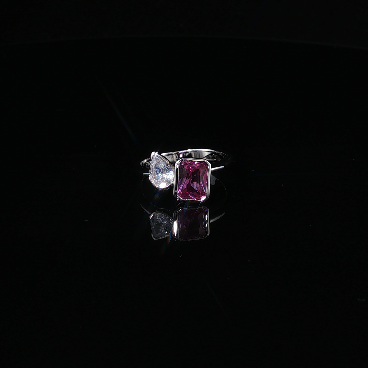 Silver Bypass Ring with Emerald-Cut Synthetic Tourmaline and Pear-Cut Zirconium