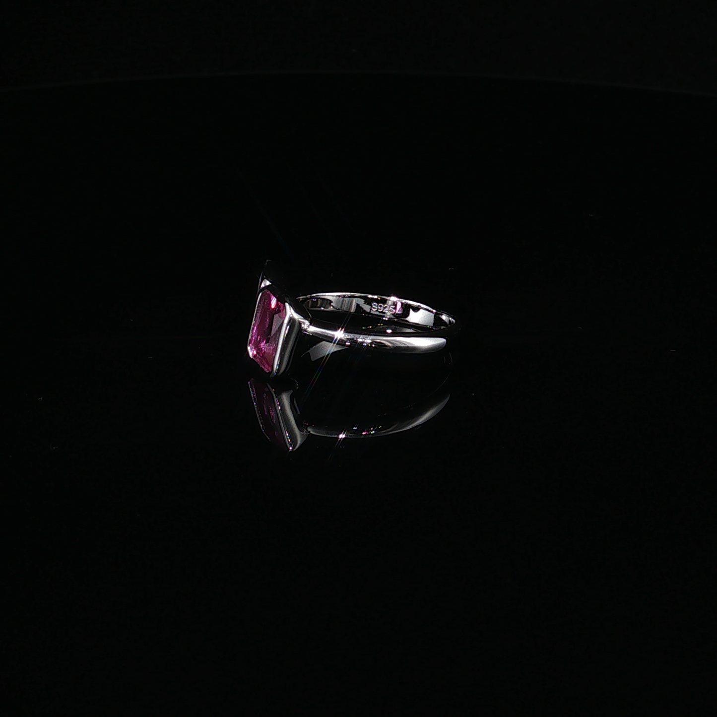 Silver Bypass Ring with Emerald-Cut Synthetic Tourmaline and Pear-Cut Zirconium