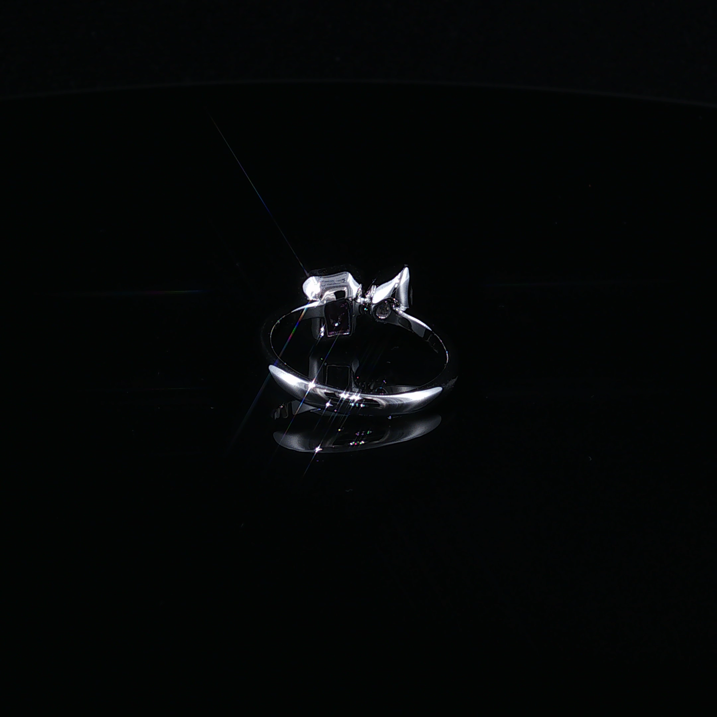 Silver Bypass Ring with Emerald-Cut Synthetic Tourmaline and Pear-Cut Zirconium
