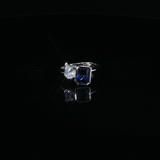Emerald-Cut Royal Blue Sapphire and Pear-Cut Zirconium Bypass Ring in Sterling silver 925