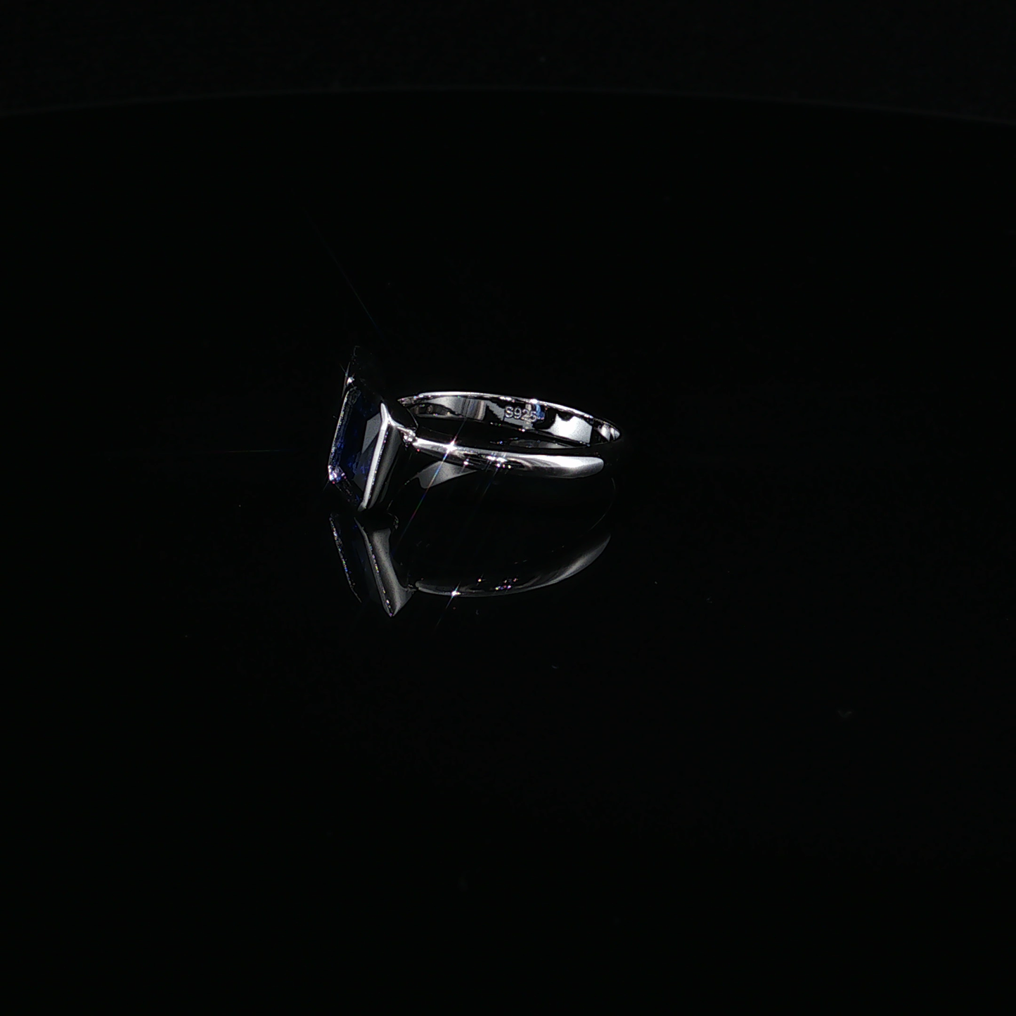 Emerald-Cut Royal Blue Sapphire and Pear-Cut Zirconium Bypass Ring in Sterling silver 925
