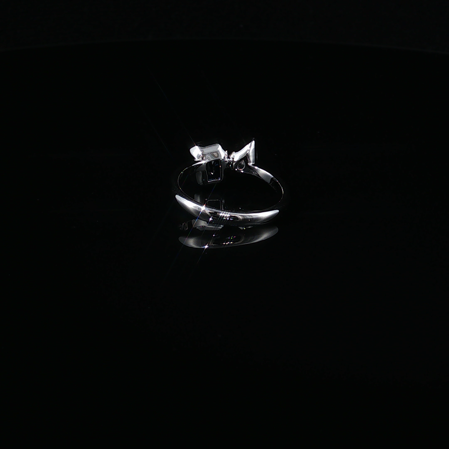 Emerald-Cut Royal Blue Sapphire and Pear-Cut Zirconium Bypass Ring in Sterling silver 925