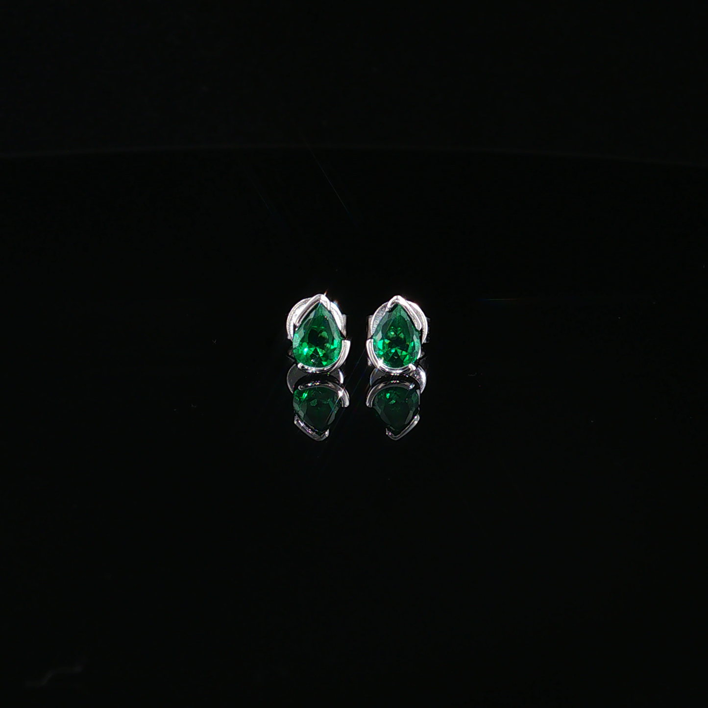 Pear-Cut Emerald Stud Earrings in Premium sterling silver