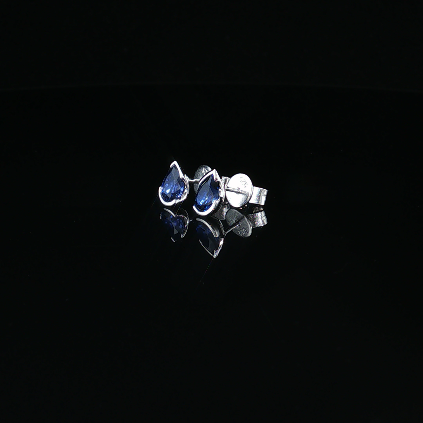 Royal Blue Pear Cut Sapphire Stud Earrings in premium Sterling Silver