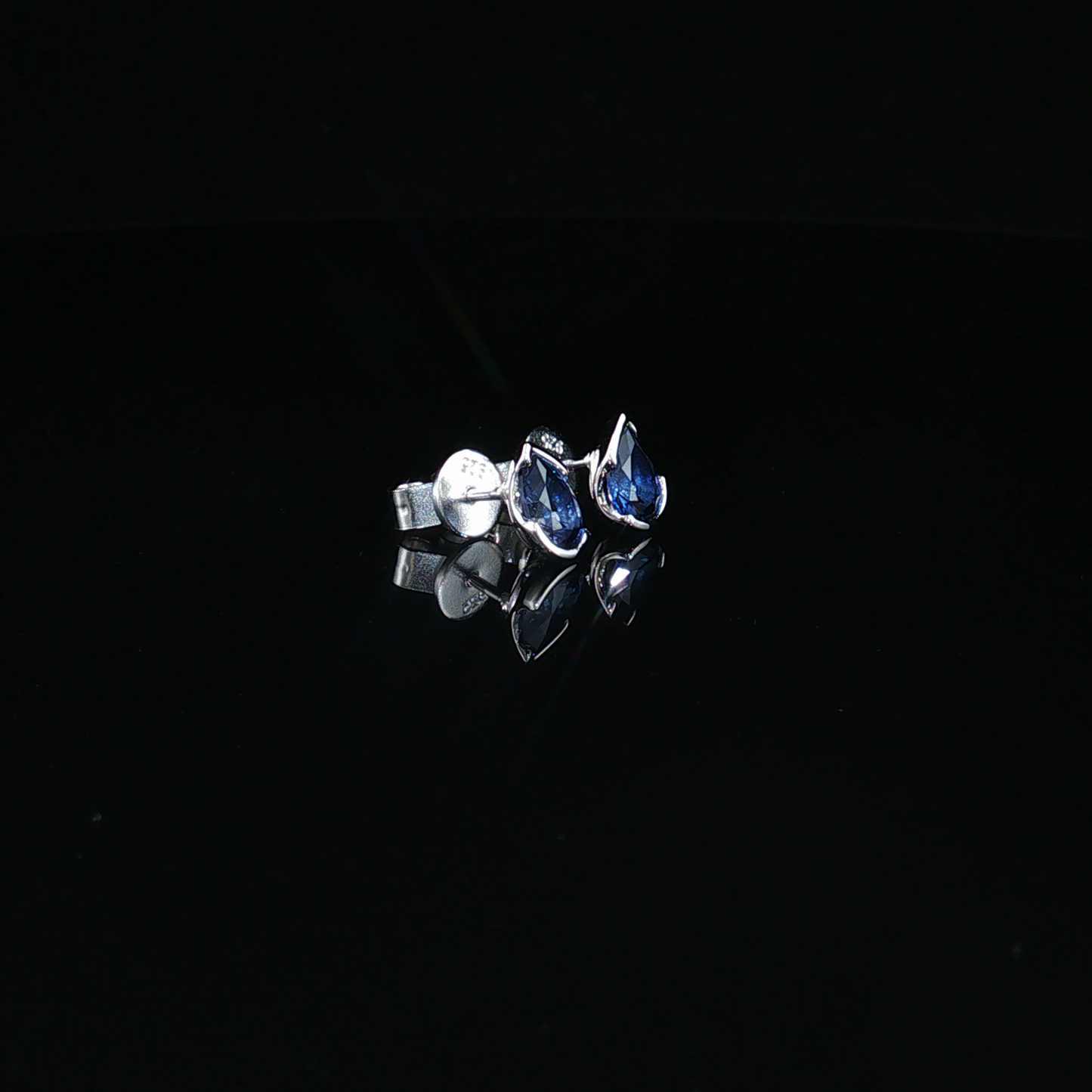 Royal Blue Pear Cut Sapphire Stud Earrings in premium Sterling Silver
