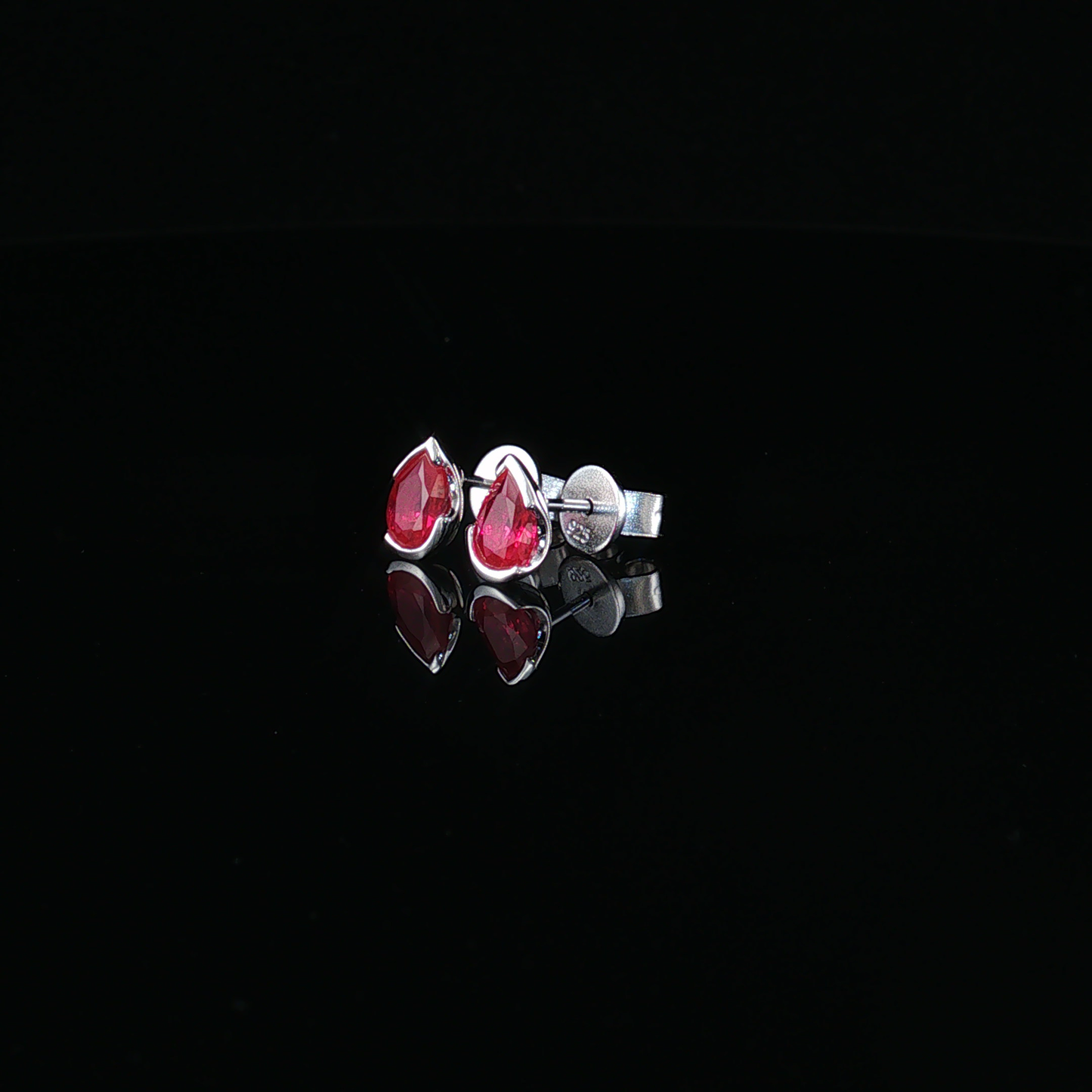 Pear-Shaped Ruby Stud Earrings in premium Sterling silver