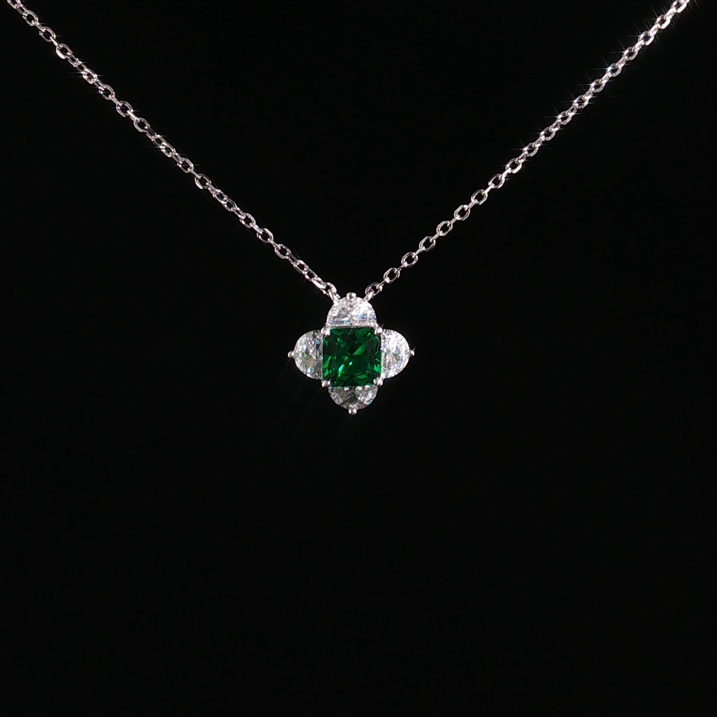 Emerald and Zirconia Halo Pendant Necklace in Sterling Silver