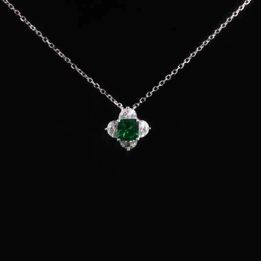 Emerald and Zirconia Halo Pendant Necklace in Sterling Silver