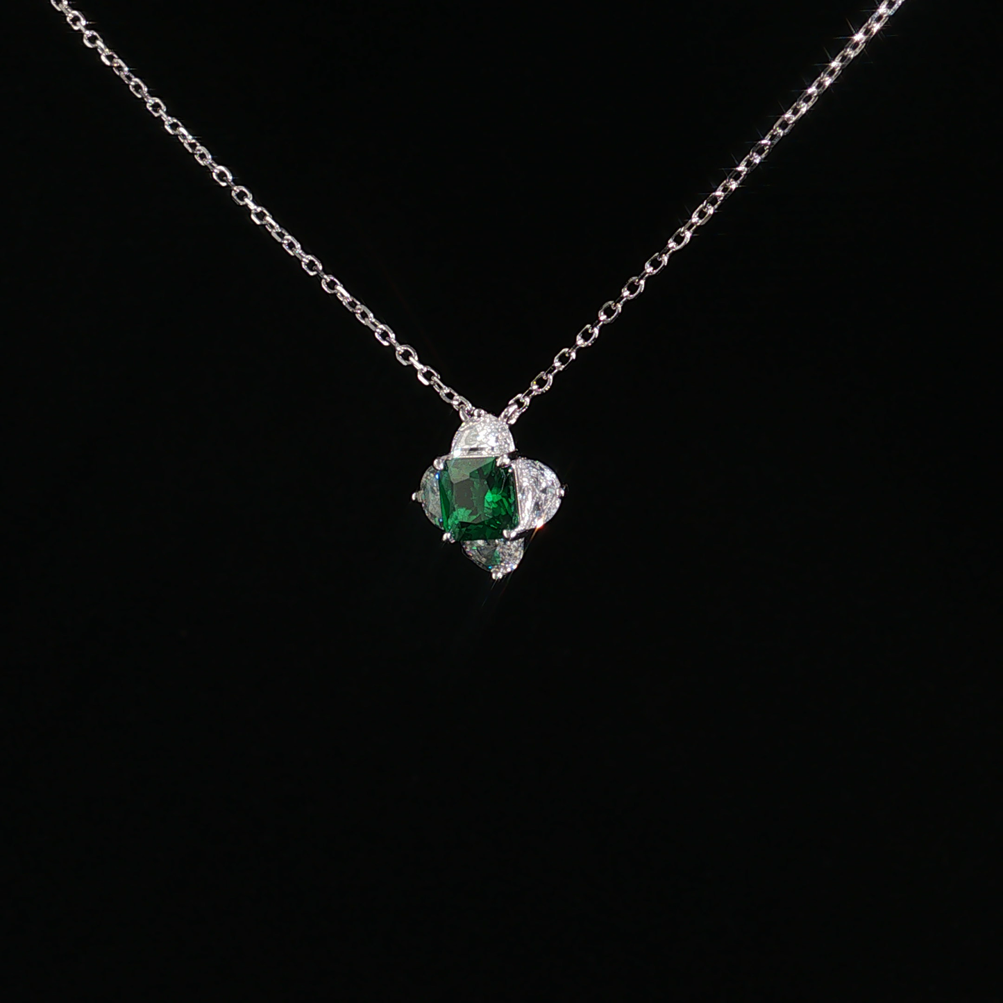 Emerald and Zirconia Halo Pendant Necklace in Sterling Silver