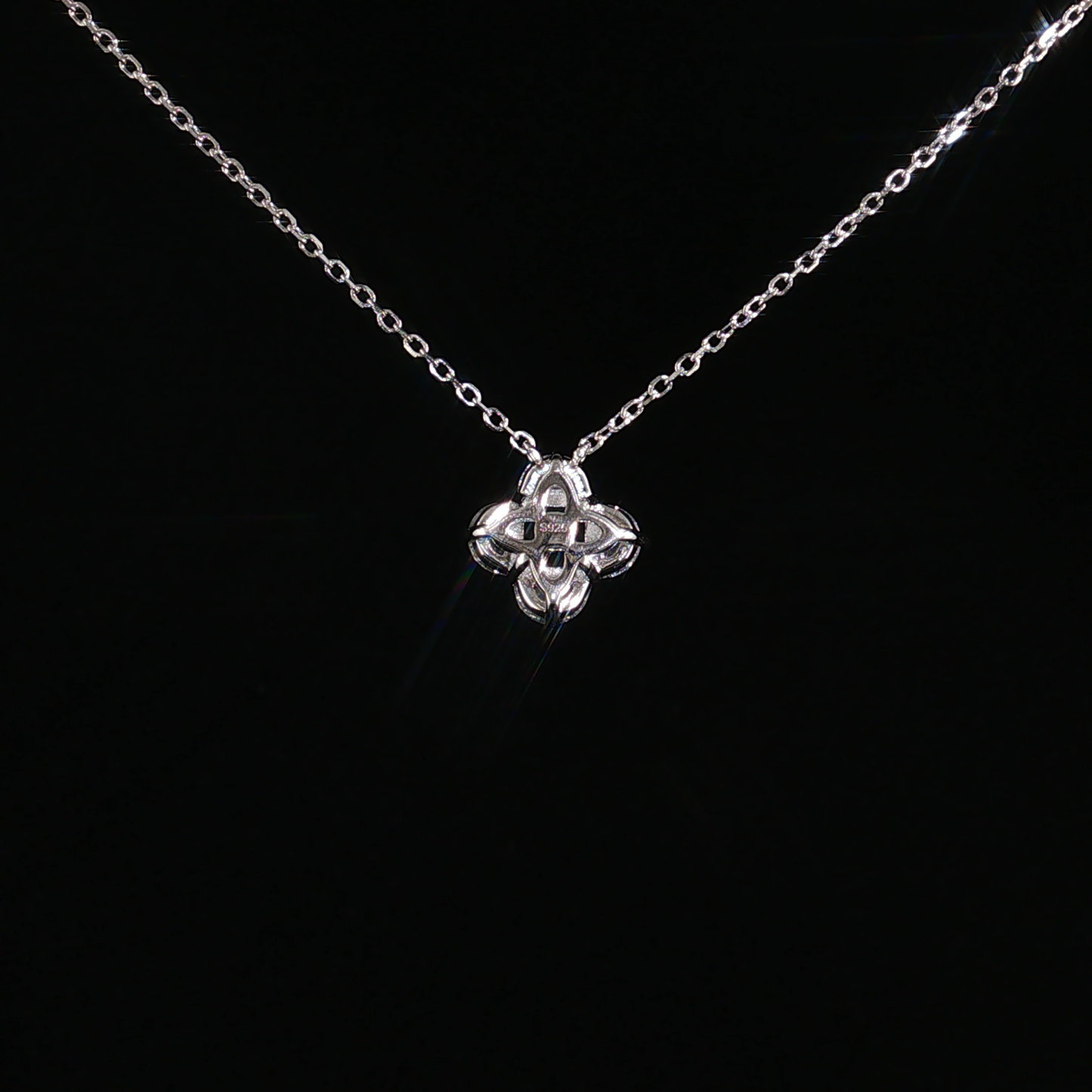 Emerald and Zirconia Halo Pendant Necklace in Sterling Silver