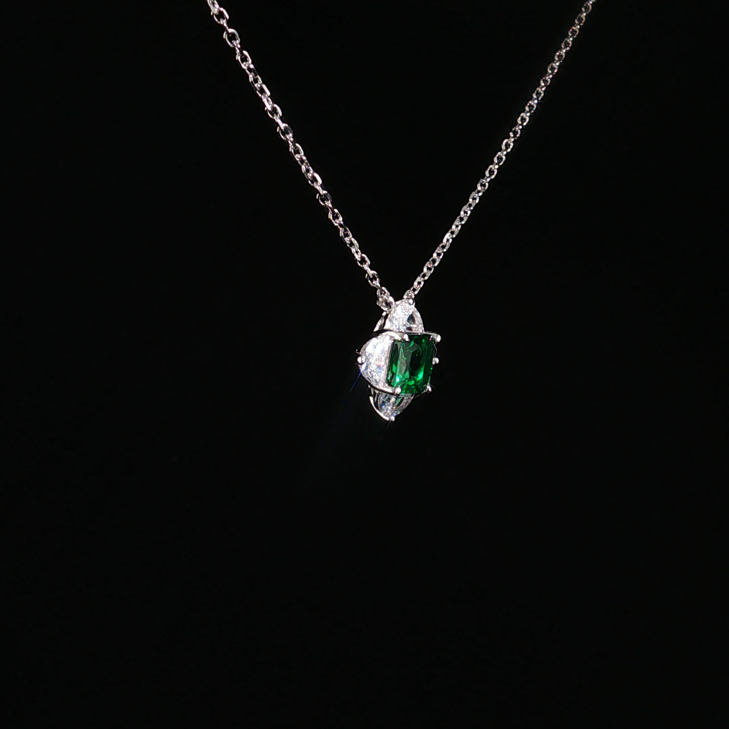 Emerald and Zirconia Halo Pendant Necklace in Sterling Silver