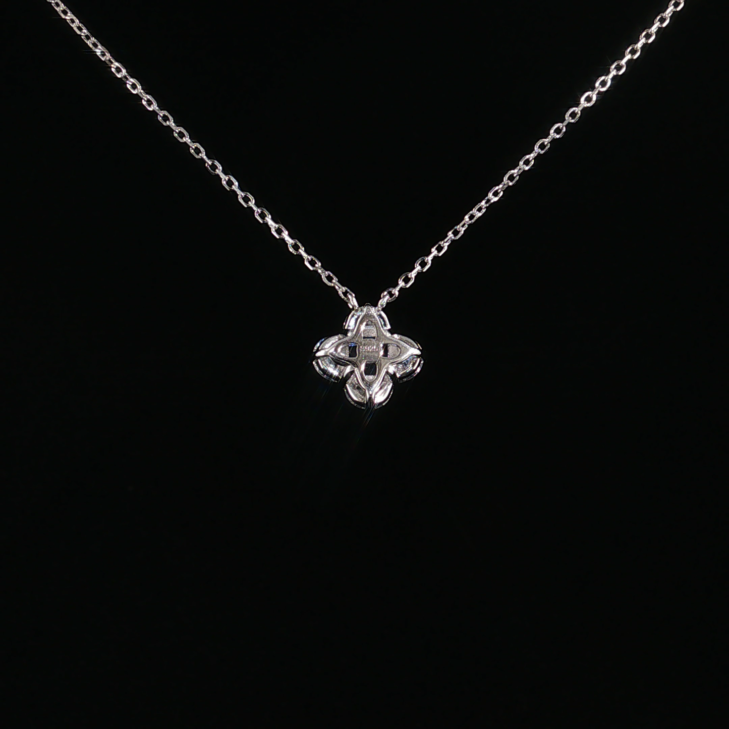 Blue Topaz Quatrefoil Charm Necklace in Sterling Silver